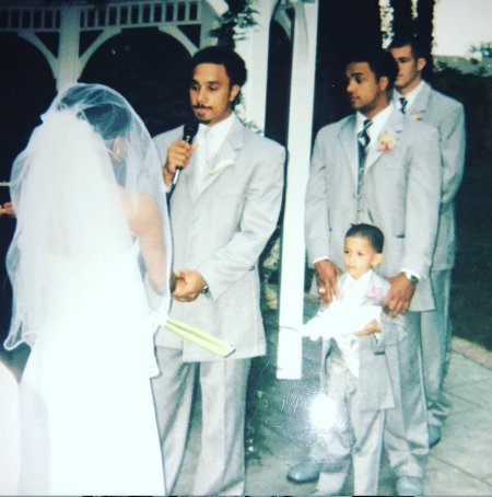 Alena Pitts mom and dad taking vows.